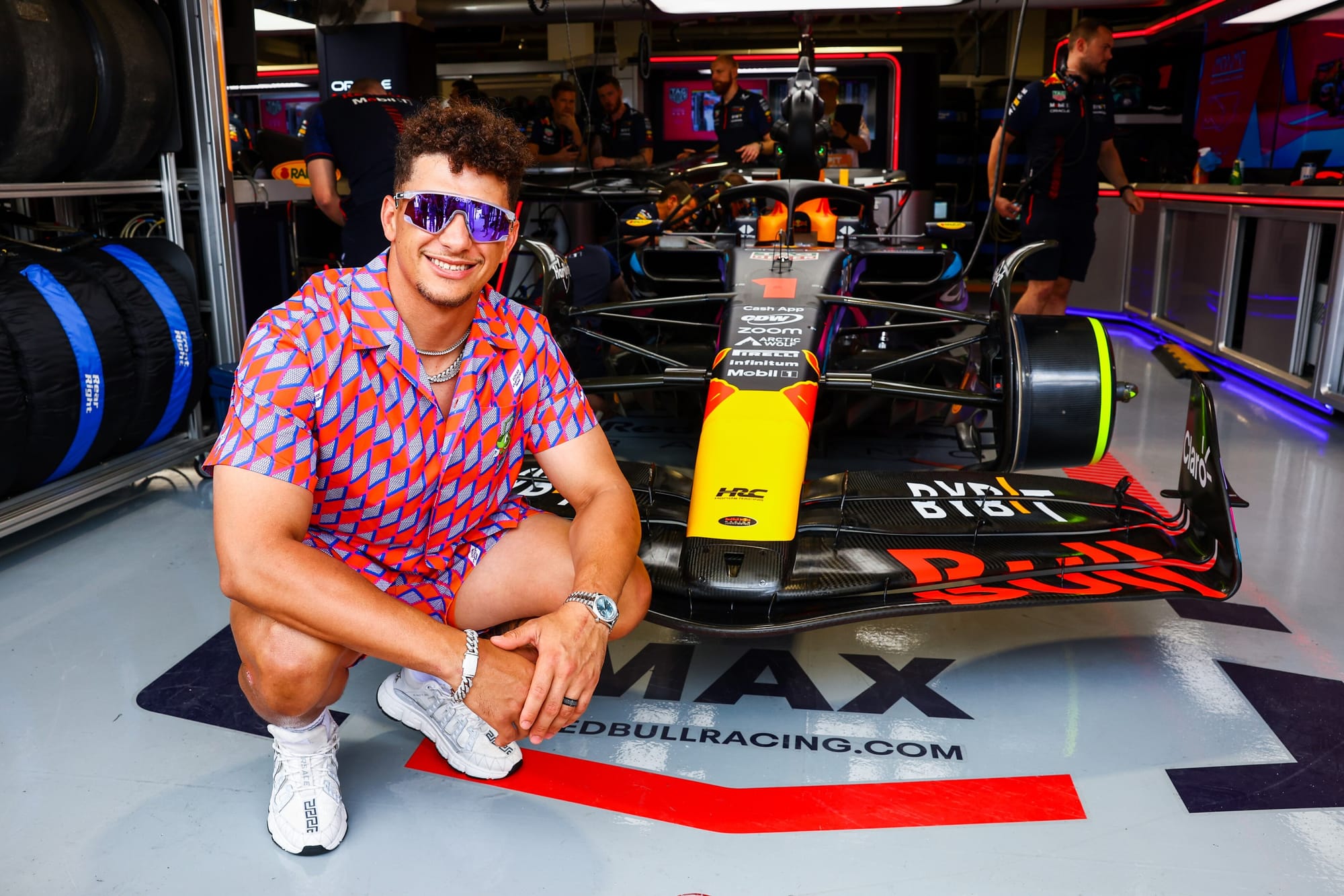 Patrick Mahomes and Red Bull F1 car