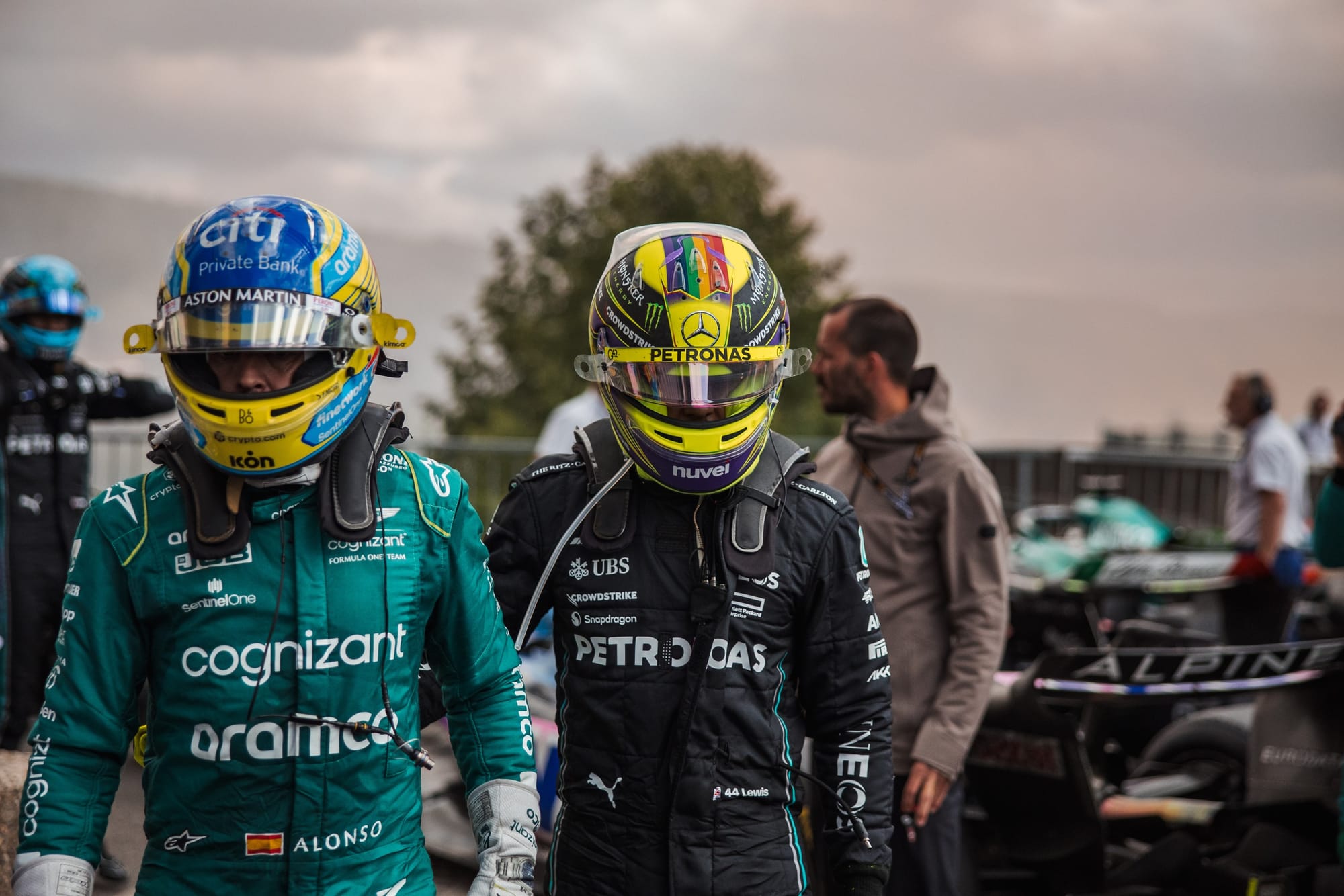 Fernando Alonso, Aston Martin, and Lewis Hamilton, Mercedes, F1