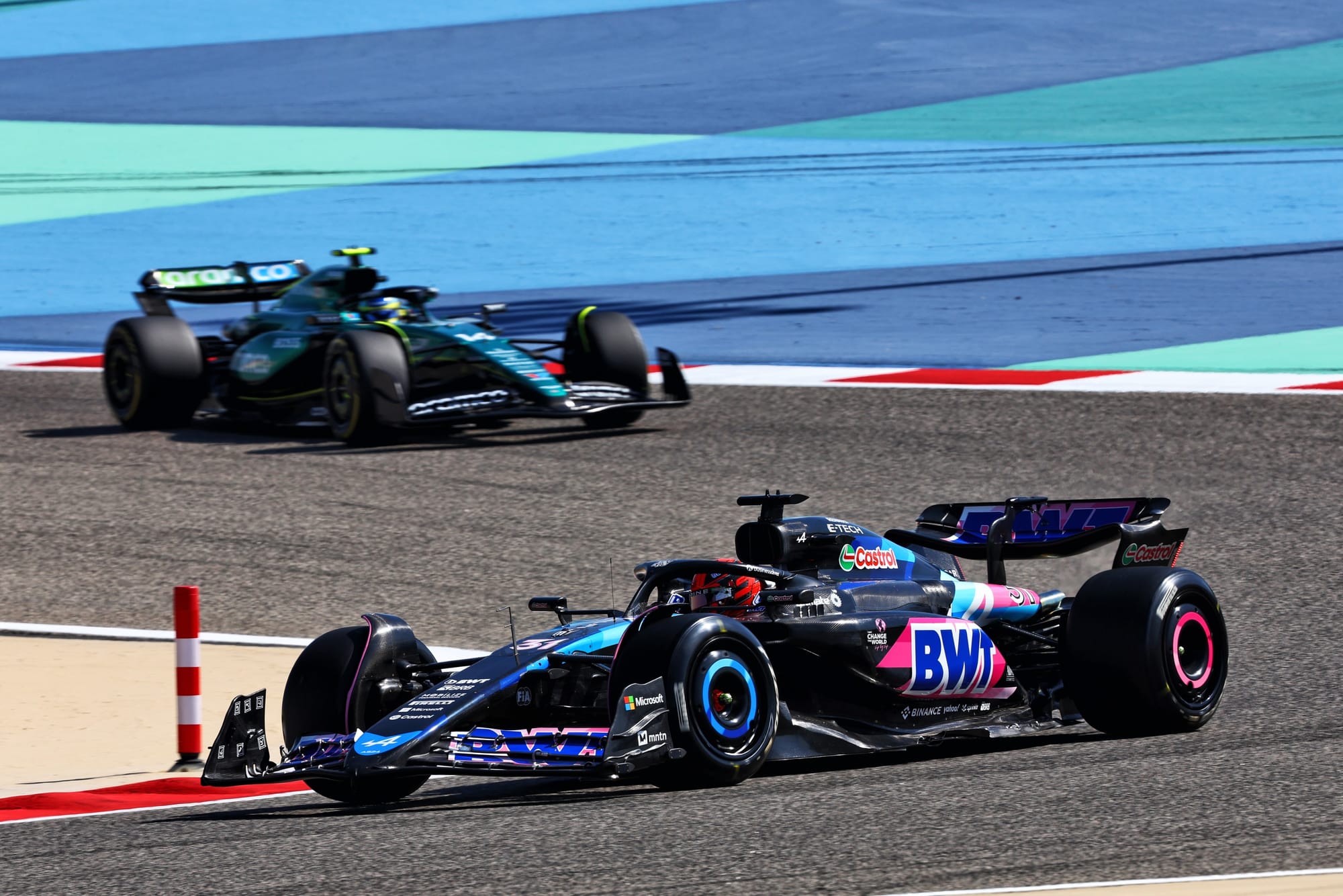 Esteban Ocon, Alpine, and Fernando Alonso, Aston Martin, F1