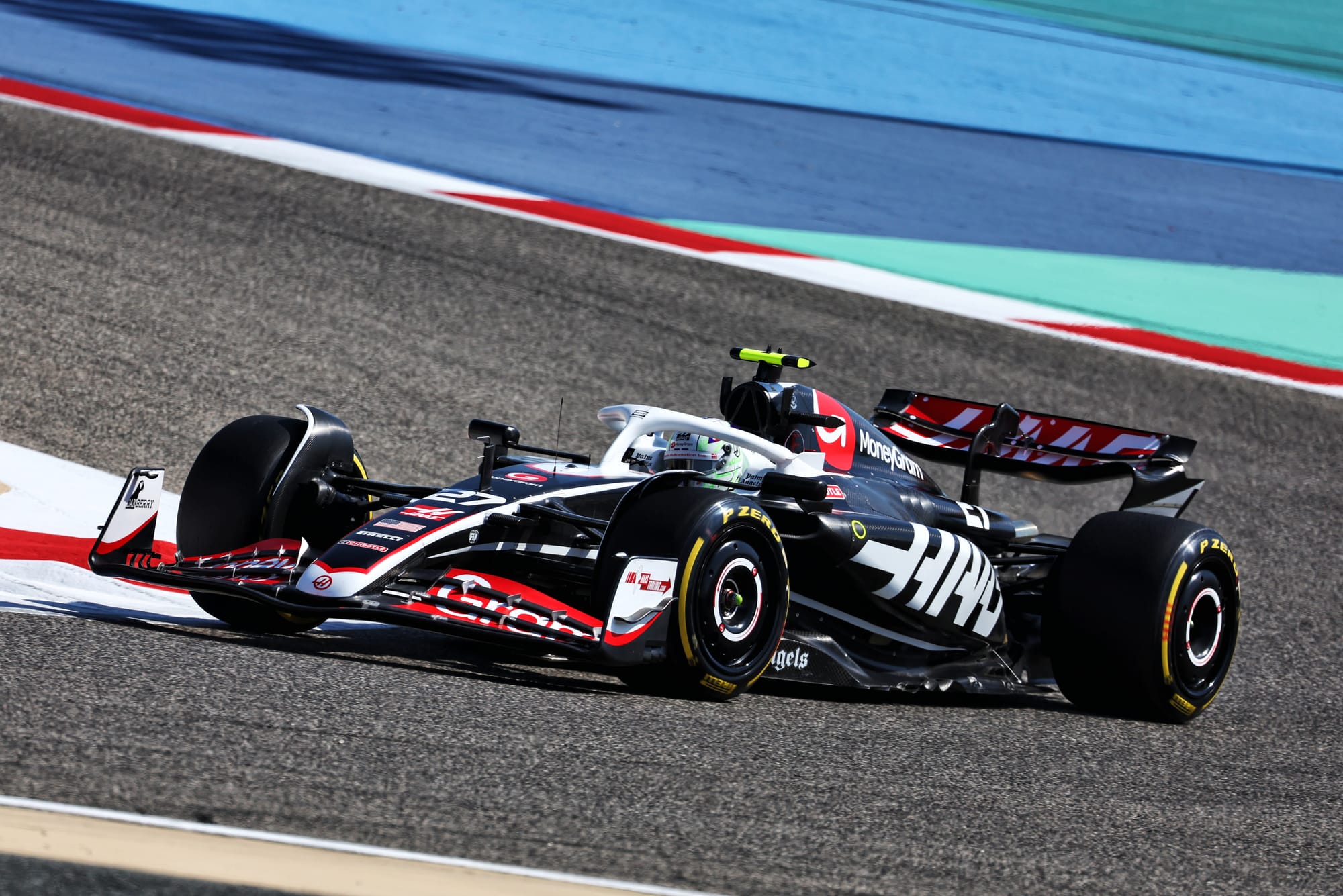 Nico Hulkenberg steers the new Haas F1 car to the right in Bahrain F1 testing, 2024