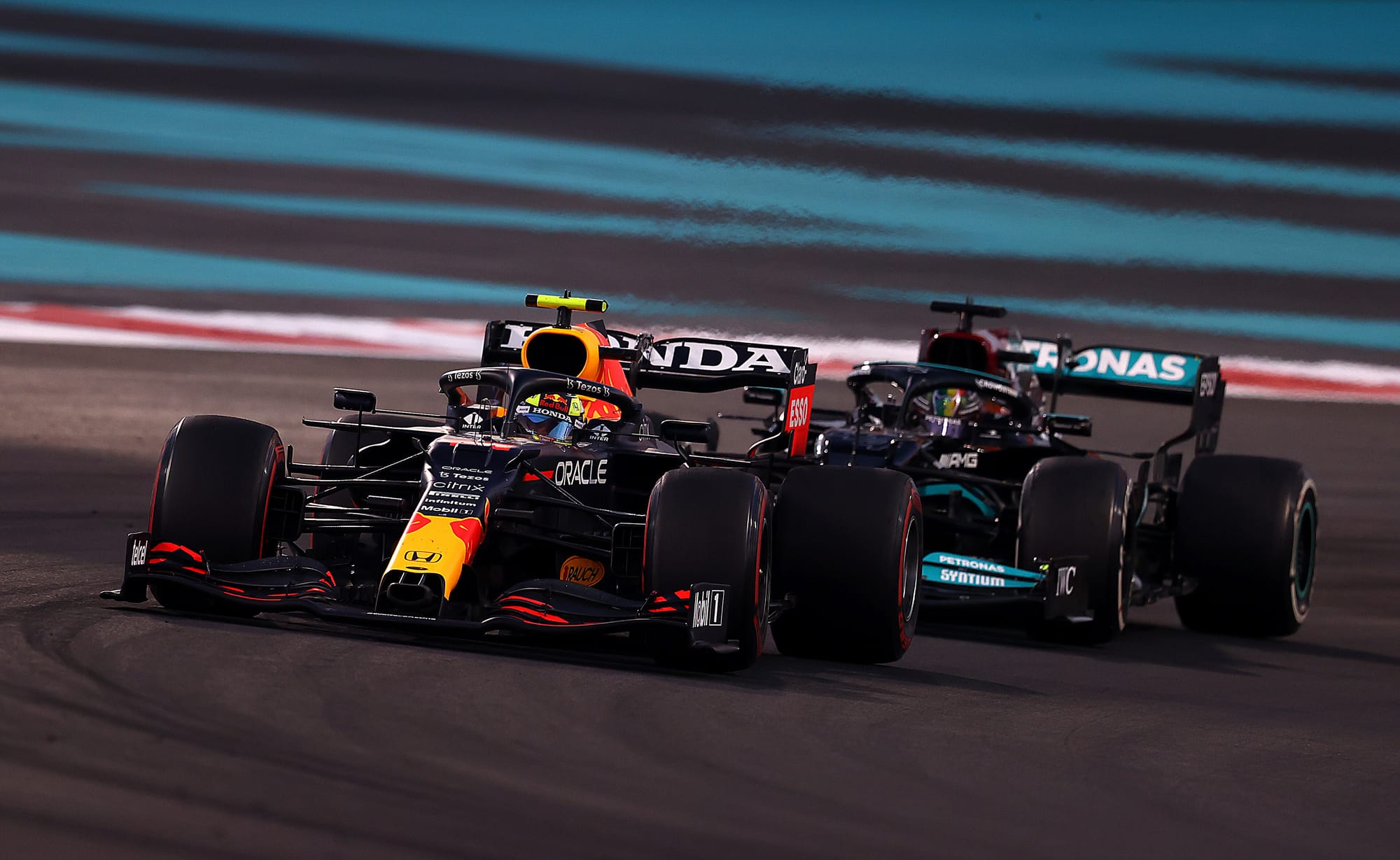 Max Verstappen, Red Bull, and Lewis Hamilton, Mercedes, F1