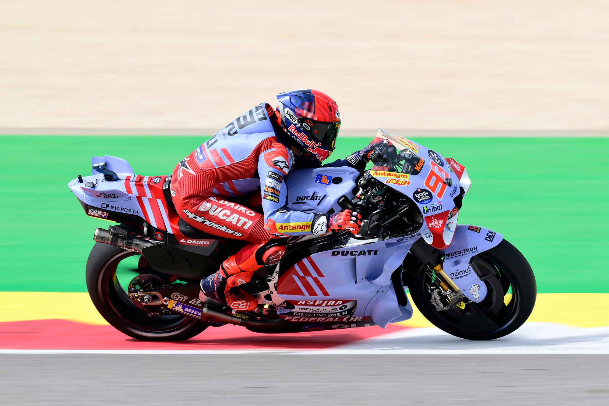 Marc Marquez racing to the right on his Ducati MotoGP bike at Portimao