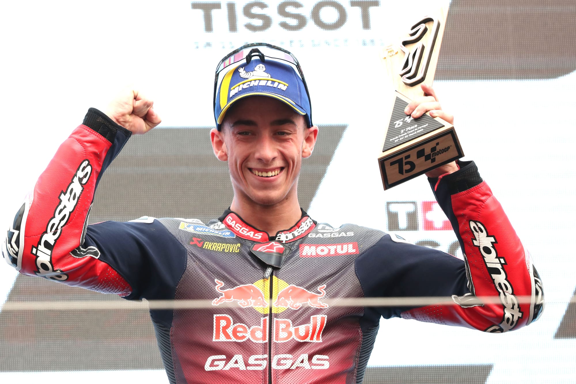 Pedro Acosta holds up his trophy for scoring a podium in the Portimao MotoGP race