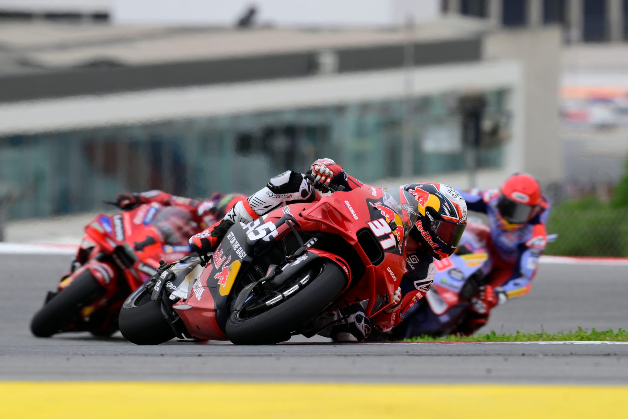 Pedro Acosta leads Pecco Bagnaia and Marc Marquez in the Portimao MotoGP race, 2024