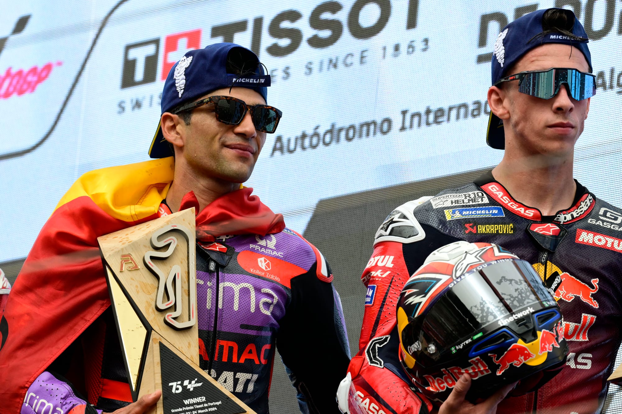 Race winner Jorge Martin and Pedro Acosta on the podium, MotoGP Portimao 2024