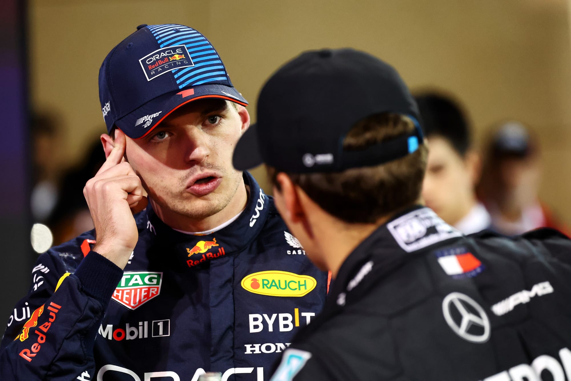 Max Verstappen, Red Bull, and George Russell, Mercedes, F1