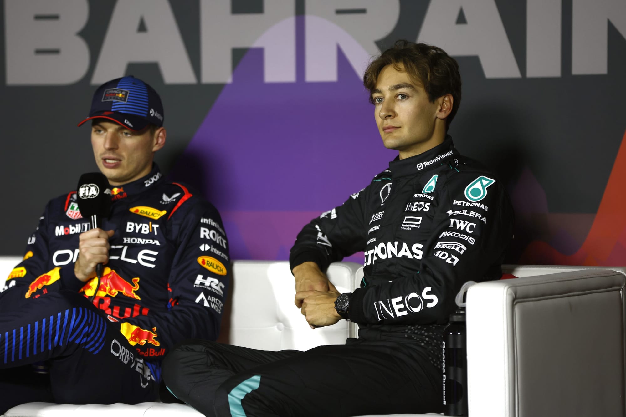 Max Verstappen, Red Bull, and George Russell, Mercedes, F1