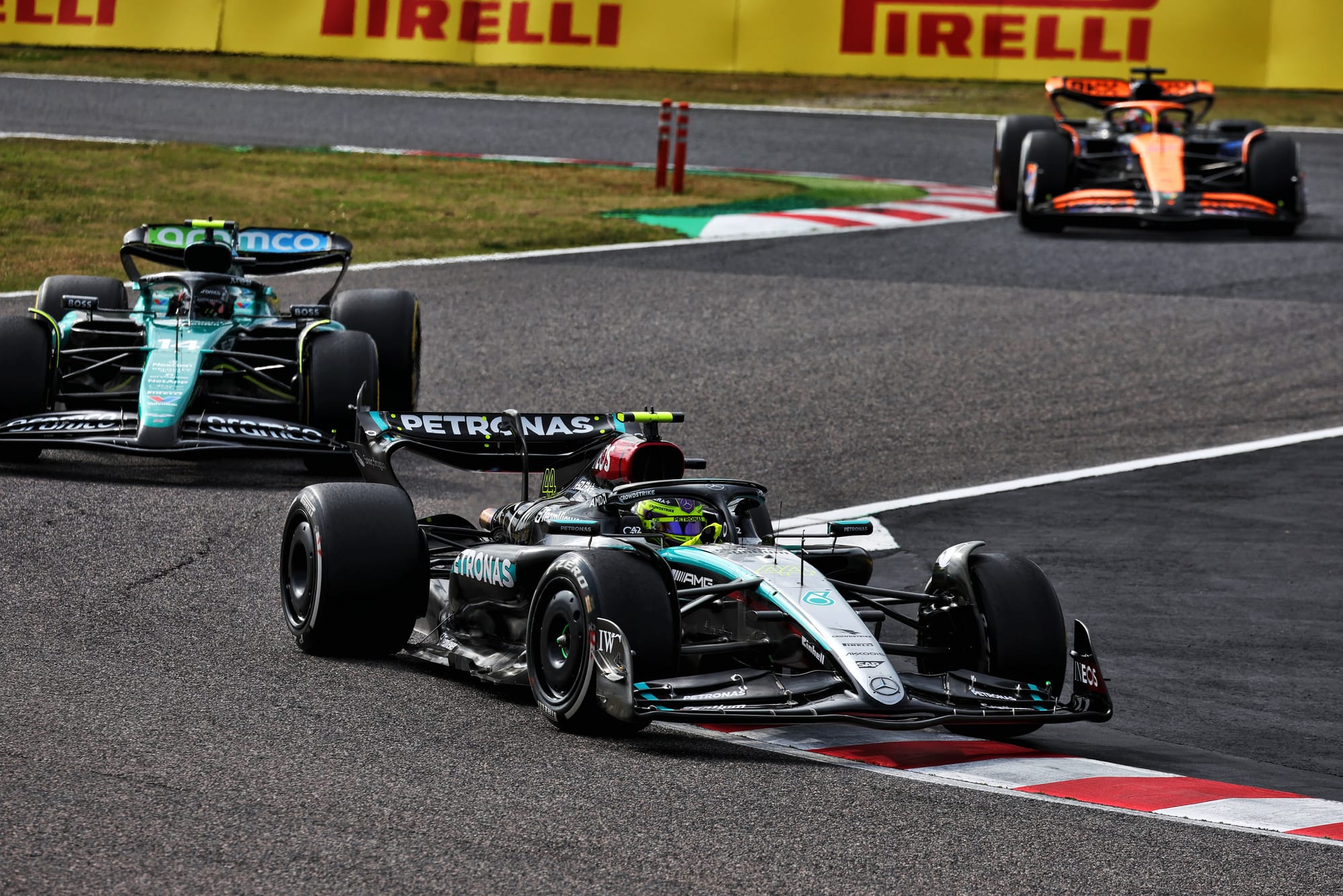Lewis Hamilton Mercedes leads Fernando Alonso Aston Martin Japanese Grand Prix 2024 Suzuka