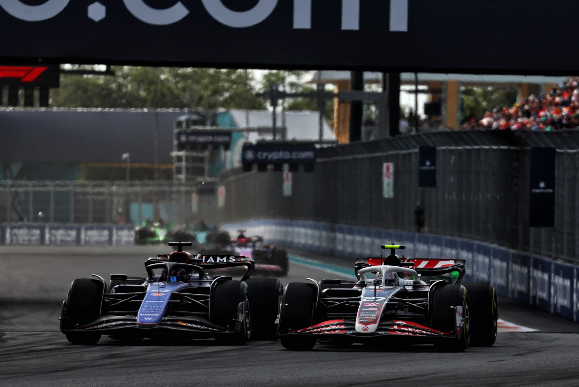 Alex Albon, Williams, and Nico Hulkenberg, Haas, F1