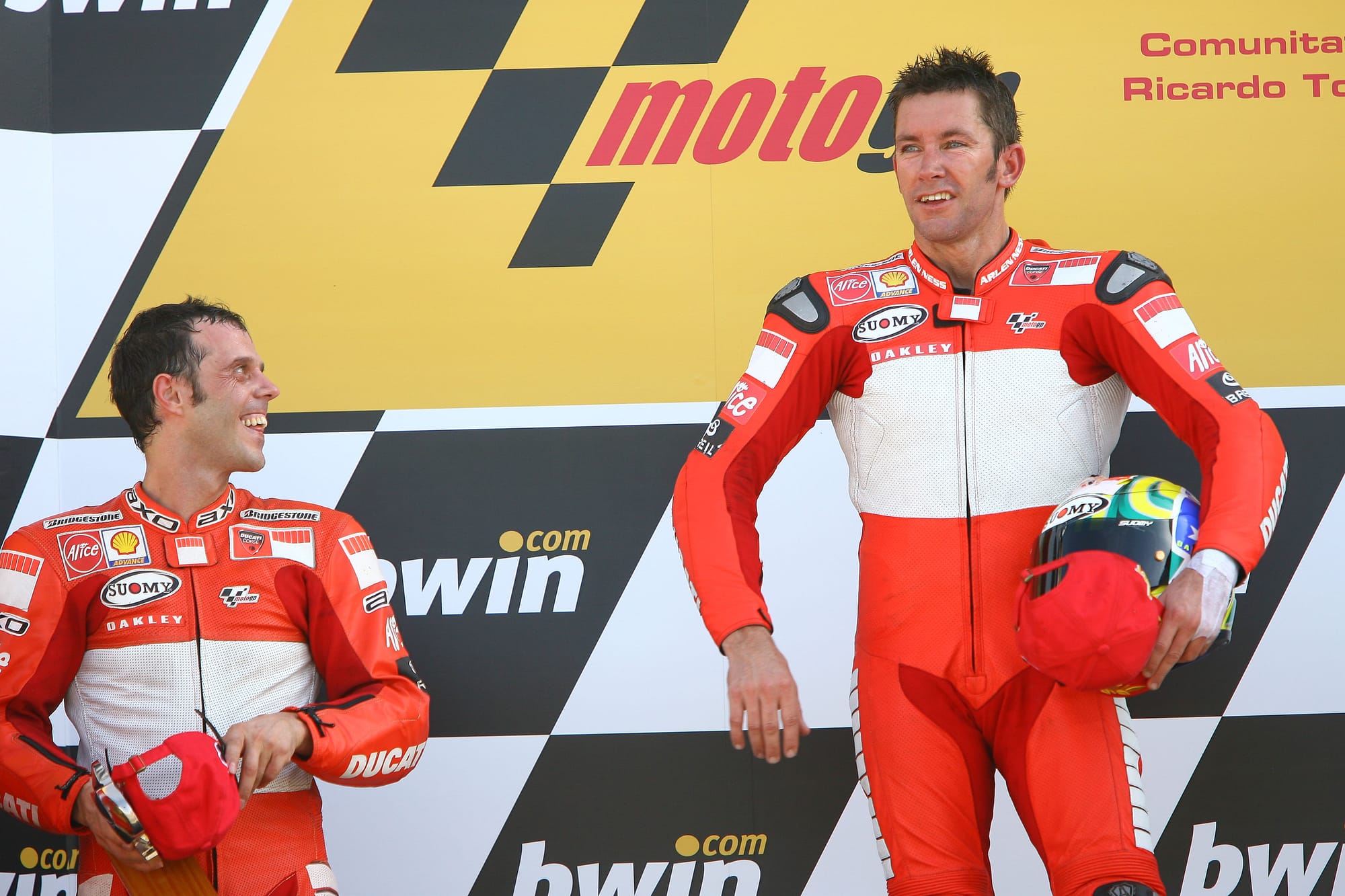 Troy Bayliss with Loris Capirossi on the 2006 Valencia MotoGP podium