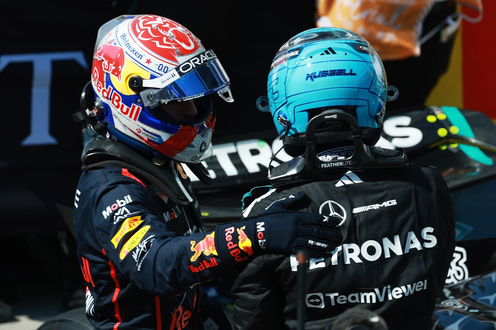 Max Verstappen, Red Bull, and George Russell, Mercedes, F1