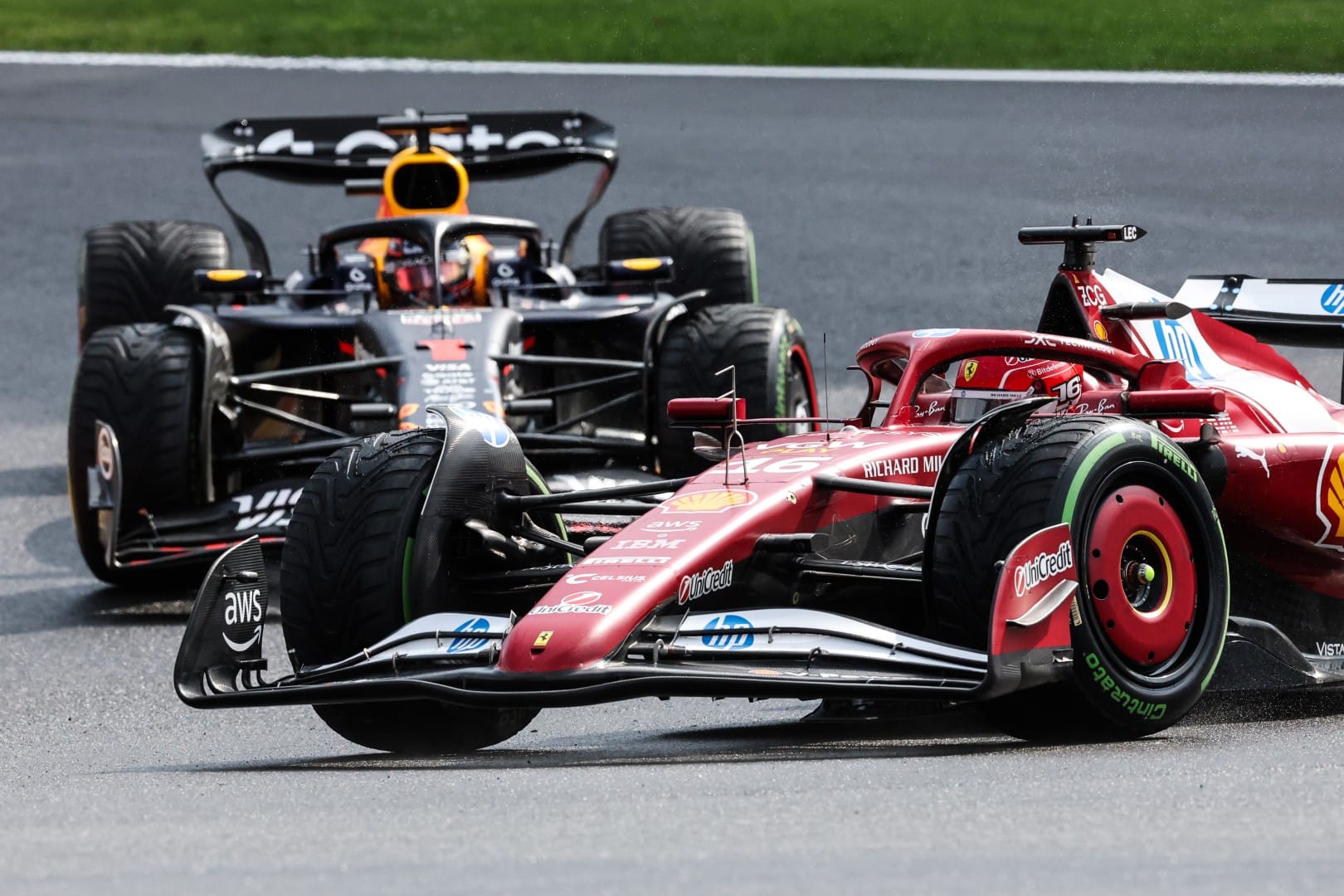 Charles Leclerc, Ferrari, and Max Verstappen, Red Bull, F1