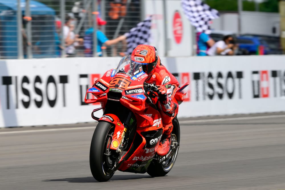 Marquez survives penalty scare to win bizarre Brno sprint